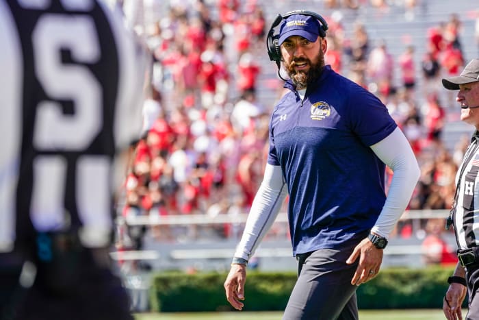 Kent State head coach Sean Lewis talking to the referees against Georgia.